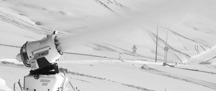 A snow cannon in action in the Alps