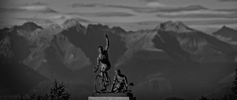 A statue outside the church honours cyclists