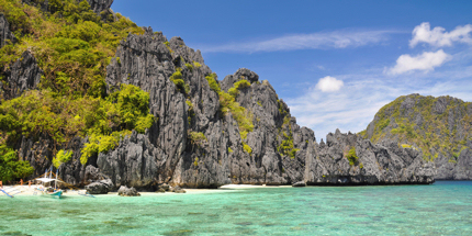 Limestone cliffs tower over El Nido's beaches