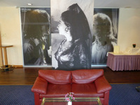 Photos of film stars adorn the walls