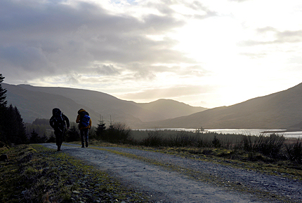 Making tracks as the sun sets over Loch Dee