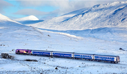 The Caledonian Sleeper scythes through the snow