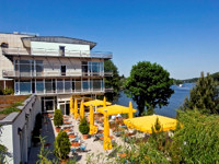 Have breakfast on the terrasse overlooking the lake