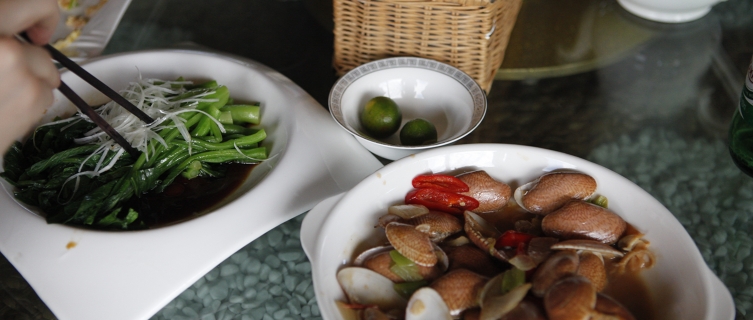 The author tries some kai-lan drizzled in an oyster dressing