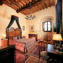 Sleep like royalty at this castle vineyard in Tuscany