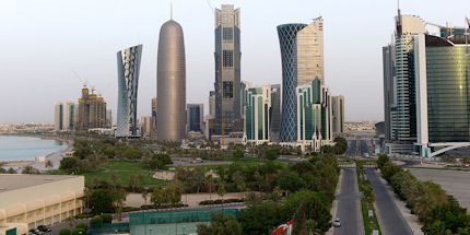 The bustling city of Doha nestled against the Persian Gulf