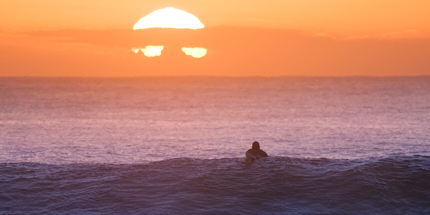 A lone surfer at Jeffrey's Bay