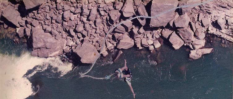 Bungee jumping above the falls