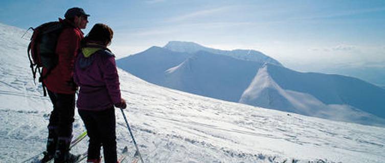 Skiers at top of the Spectre Run